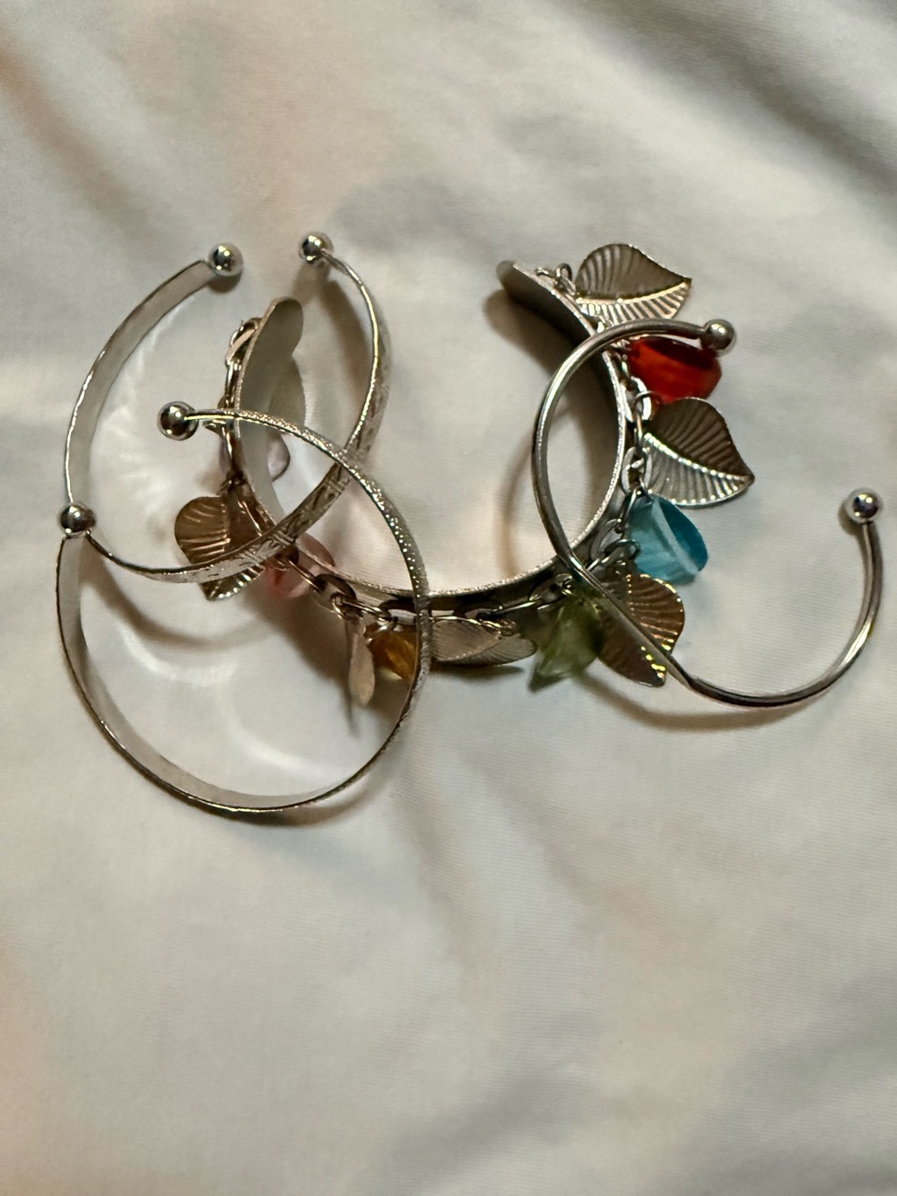 Lot of 4 Silver Tone Cuff Bracelets w/ Leaf Dangle Charms, Multicolor